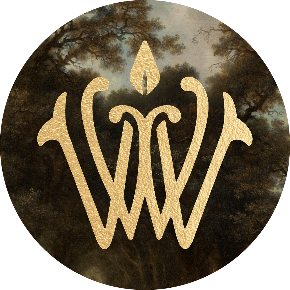 Gold Wonderwick flame-and-W monogram over a dark, moody forest painting